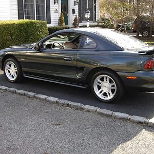 100% stock minus a CAI & a flowmaster cat back exhaust.