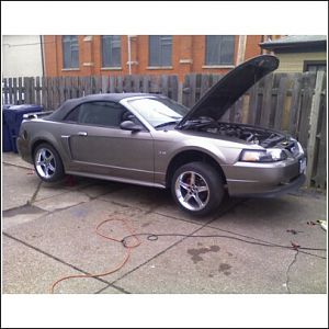 In the air for removing the valve body (note the incredibly small city drive way)