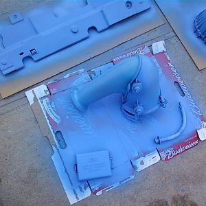 the rest of the air intake with the fuse box.