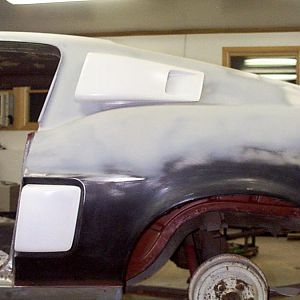 in process after new quarter is fitted. I had to use one from a notchback because the fastback ones were not available with the proper early side mark