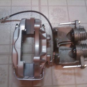 look at the size difference 4 piston vs 2 piston