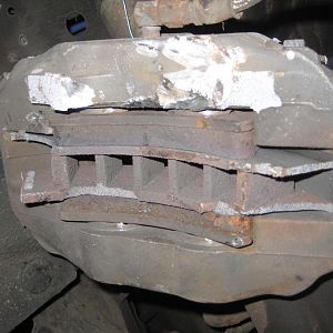 The BAD...this is what is left of the caliper and rotor. As you can see a small portion of the rotor remains in the caliper.