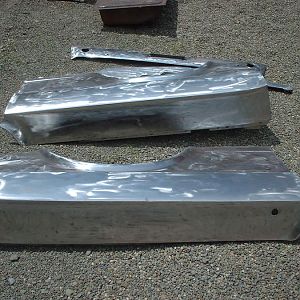 I stripped the paint off the entire car using a 3M stripping disk with a grinder.