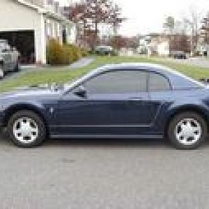 Side with stock tires (just changed to wider and taller) pics comin soon w/ those on it