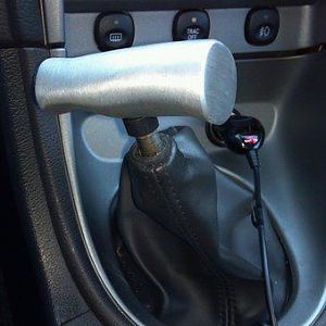 T-handle.  Sadly, on stock shifter for now.  I've loved the look since I was a kid and found this one for less than $20 on Amazon. Hey... why not?