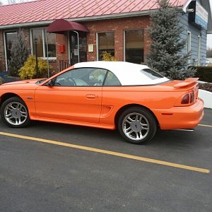 The new top is finished. Will get a close up when the rain stops. Right now she is tucked in again.