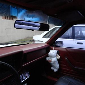 Angelfied: Halo on rearview mirror, Angel bag for trash