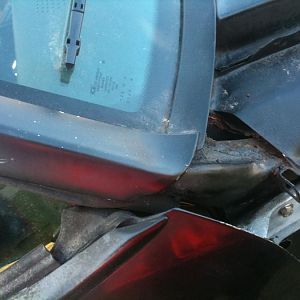 small hole in subrame below the pass side of windshield..