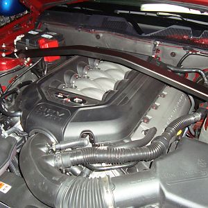 I installed my strut tower brace, the easy part of stiffening the car up. AutoHaus is going to get to weld in the sub-frame connectors. :)