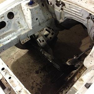 Old engine bay after wires and before paint