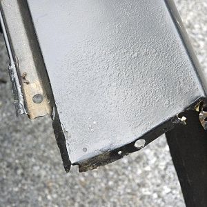 close up of some rot and missing metal