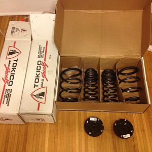 New suspension parts. Eibach Pro-Kit springs, Tokico HP struts, and GT500 strut mounts.