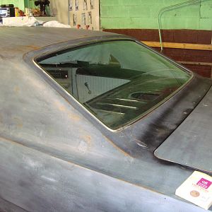 This picture shows some evidence of a vinyl top that was torn off and will be getting replaced.