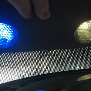 Stock dome light on right new blue 10k led light