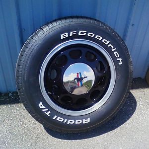 stock 10-hole wheels polished outer lip / center caps and inner section painted Tuxedo Black