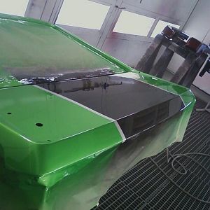 I welded up the stock key lock hole and smoothed it. replaced it with a power hatch release. Sweeeeet.