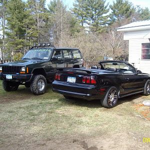 Step-son's Jeep w/ the Stang
