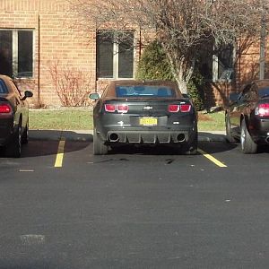 Drove in to work one morning and they were parked side by side and the third spot was open so I figured it was a photo op.