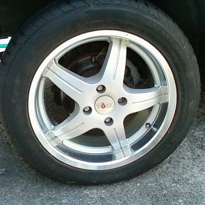 225x55x16 tires on Voxx wheels. a lot cheaper than $400.00 a piece metric radials.