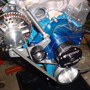 Front of the motor. No AC No Power Steering.