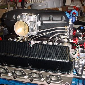 ALUMINUM BOSS 302 BLOCK ALL FORGED 363. WITH THE EIGHT NX Nitrous Express Shark Nozzle Foggers plumbed. On the passengers side of the motor.