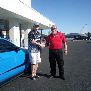 Dave Munford (salesmen) and I @ dealer's about to drive Elvis home for the first time :)