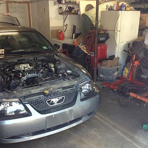 In the garage gettin ready to be torn apart.