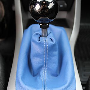 Completed shifter setup. Blox Racing 490 Limited Series Platinum shift knob, Steeda short throw shifter, and custom shortened RedlineGoods shift boot.