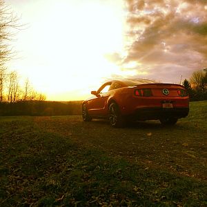 on top of the hill at sunset