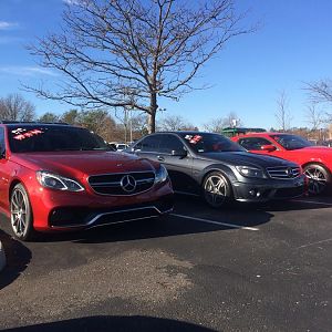 Festive vehicles. Brand new twin turbo AWD E63, friends C63