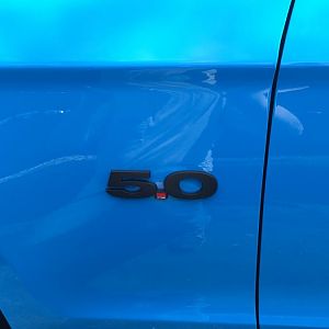 Plasti-dipped badge to match the theme of the car. Came out pretty well. Nice way to try out a look before painting/replacing a piece.