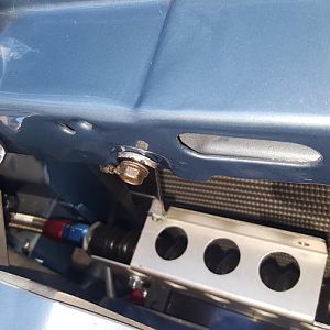 My B&M trans cooler and fan. Bolted behind my front bumper. And in front of my 3 row radiator