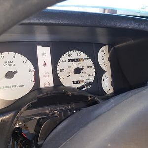 Cluster got a white face. And a new glass. Blanked to 00000 miles.