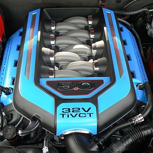 Original cover after Rustoleum spray bomb treatment