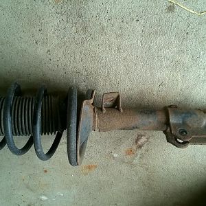 Old Strut out and ready for disassembly.