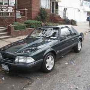 outside of his house in Brooklyn