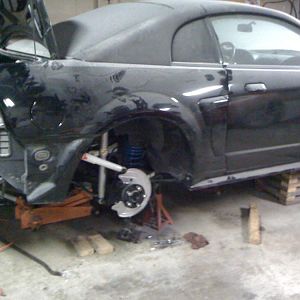 rear end is back in and buttoned up with new bushings,shocks,quads,lowering springs,fuel pump,brakes and rotors.