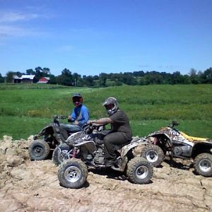 this is our old property up north belive it or not we were parked on top of a 30 foot tall pile of dirt we got bord decided to make a lake lol parents